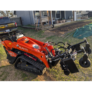 Wired Equipment Inc - Kubota SCL1000 with Land Pride CSR1048 Power Rake - (940) 202-8413 - Decatur TX